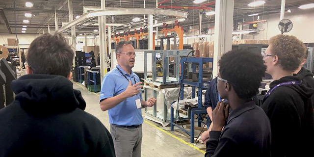 Local students take a tour of Melitron's manufacturing facilities for Manufacturing Day 2019.